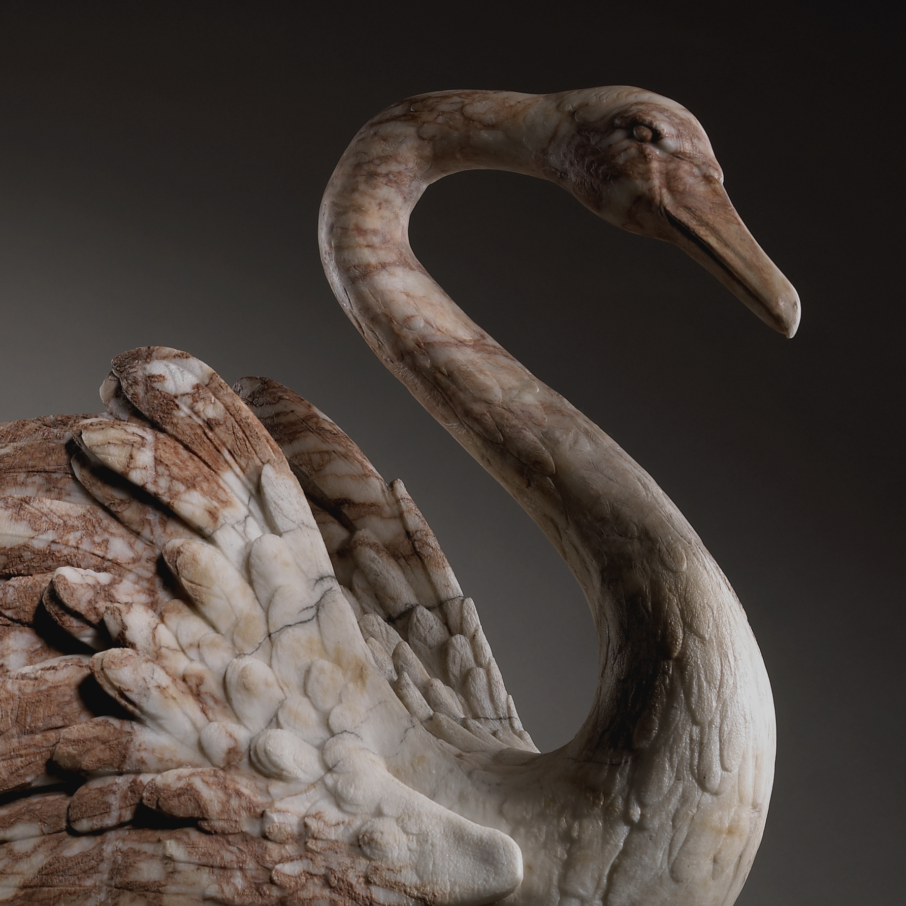 A set of four English alabaster swans